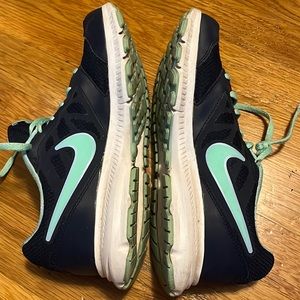 Nikes size 8 blue and green sneakers